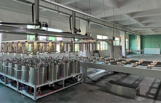 Línea de recubrimiento de espín totalmente automatizada para interiores de productos de celulosa moldeada. Para un recubrimiento eficiente resistente al agua / aceite en contenedores y bandejas de alimentos.